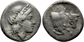 IONIA. Magnesia ad Maeandrum. Obol (Circa 350-325 BC). 

Obv: Laureate head of Apollo right.
Rev: MAΓ. 
Forepart of humped bull right; maeander pa...