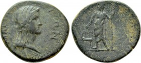 IONIA. Magnesia ad Maeandrum. Pseudo-autonomous. Ae (2nd century AD). 

Obv: MAΓNHTΩN. 
Draped and veiled bust of Boule right.
Rev: Dionysos stand...