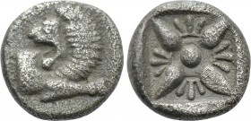 IONIA. Miletos. Obol or Hemihekte (Late 6th-early 5th centuries BC). 

Obv: Forepart of lion right, head left.
Rev: Stellate pattern within incuse ...