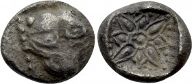IONIA. Miletos. 1/16 Stater (Late 6th-early 5th centuries BC). 

Obv: Facing head of lion or panther.
Rev: Stellate design, pelleted border around;...