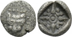 IONIA. Miletos. 1/64 Stater (Late 6th-early 5th centuries BC). 

Obv: Facing head of lion or panther.
Rev: Stellate design, pelleted border around;...
