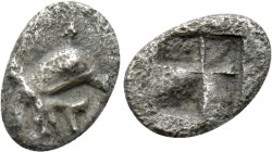 IONIA. Teos. Hemitetartemorion (Circa 540- 510 BC). 

Obv: Head of griffin right; with split tongue.
Rev: Quadripartite incuse square.

Matzke 89...
