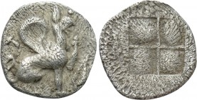 IONIA. Teos. Tritemorion or Tetartemorion (Circa 450-425 BC). 

Obv: T. 
Griffin seated right, raised forepaw. Control: grain.
Rev: Quadripartite ...
