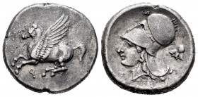 Corinthia. Corinth. Stater. 400-350 a.C. (Bcd-Corinth 115). (Calciati-402). (Ravel-1040). Anv.: Pegasus flying left, below Ϙ. Rev.: Head of Athena on ...