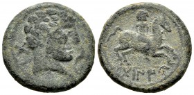 Tabaniu. Unit. 120-20 a.C. Area of Aragón. (Abh-886). (Acip-1606). Anv.: Male head on the right, dolphin, behind Iberian letters TABA. Rev.: Horseman ...