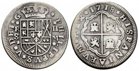 Philip V (1700-1746). 2 reales. 1718. Sevilla. M. (Cal-977). Ag. 4,98 g. Rosetas acotando ceca, ensayador y valor. Rara. VF/Almost VF. Est...75,00. //...