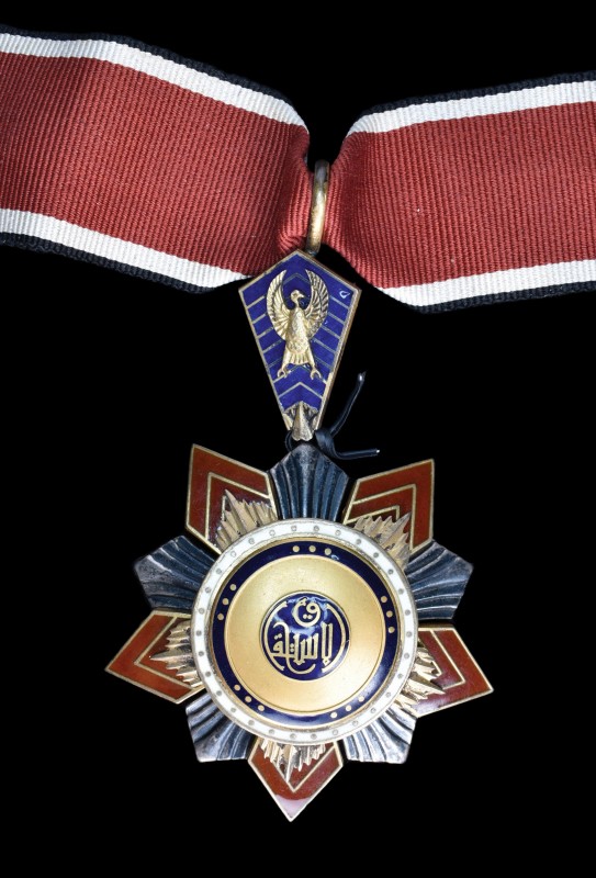 Egypt, Order of Independence, Third Class neck badge, by Fuchs, in silver, gilt ...