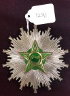 Mauritania, Order of Merit, breast star, by Arthus Bertrand, in silver, with gilt and green enamelled centre, 81.5mm, extremely fine
Estimate: £140-£...
