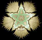 *Morocco, Order of the Throne, First Class breast star, by Bichay, in silver-gilt and green enamel, 76mm, extremely fine
Estimate: £300-£400