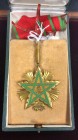 Morocco, Order of the Throne, Third Class neck badge, by Arthus Bertrand, Rabat, in silver-gilt and green enamel, 55.5mm, in case of issue, extremely ...