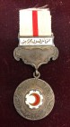 Turkey, Ottoman Empire, Red Crescent Medal, 1912, in silver and enamels, with suspension, reverse bearing silver purity mark ‘900’, 27.5mm width, extr...