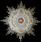 *China, Imperial Order of the Double Dragon, type 2 (1900-1911), First Class, Third Grade, breast star, in silver-gilt and enamels, with central plain...