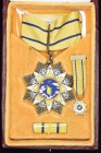 *China, Order of the Cloud and Banner, type 1, Third Class neck badge, in silver-gilt and enamels, reverse with raised inscription and numbered 40, 57...