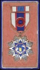 *China, Order of the Cloud and Banner, type 1, Fourth Class breast badge, in silver-gilt and enamels, reverse with raised inscription and numbered 329...