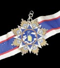 *China, Order of the Cloud and Banner, type 2, Fourth Class neck badge, in silver-gilt and enamels, reverse with stamped inscription and numbered 1166...
