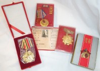 China, People’s Republic, Police Department Merit Medal, Third Class (2), in gilt metal and red enamel and anodised aluminium and enamel, both in plas...