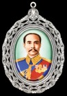 Thailand, Rama V Badge, an oval miniature facing portrait of Chulalongkorn (Rama V) in uniform, wearing medals contained in an openwork silver frame w...