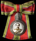 Thailand, Rama V Badge, a circular facing photograph of Chulalongkorn (Rama V) in uniform, medals and brocade of uniform gilded, contained in a jewel ...