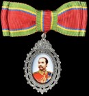 Thailand, Rama V Badge, an oval miniature three-quarters facing portrait of Chulalongkorn in uniform, wearing Order of Chakri and medals, in jewel cut...