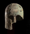 OUTSTANDING CORINTHIAN BRONZE HELMET
650 - 600 BC
height cm 22

Corinthian helmet of a Greek warrior, well preserved and of extraordinary beauty a...
