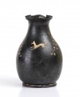 APULIAN TREFOIL OINOCHOE IN GNATHIA STYLE
Second half of 4th century BC
height cm 15

Very elegant oinochoe, with glossy black glaze and decorativ...