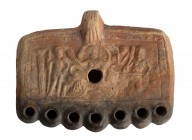ROMAN MULTINOZZLED OIL LAMP
2nd - 3rd century AD
height cm 10,5; length cm 14,5

Characterized by multiples nozzles. A moulded decoration is arran...