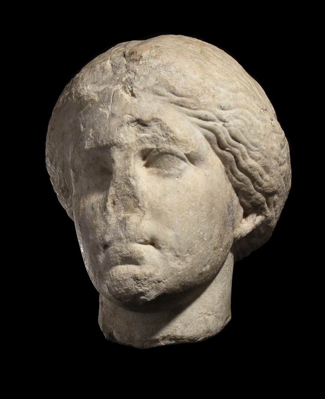 GREEK ATTIC MARBLE HEAD OF A WOMAN
4th century BC
height (head) cm 31; height ...