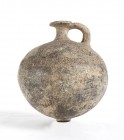 NEAR EASTER EARTHENWARE JUGLET
Tell el-Yahudiyeh, 1600 – 1050 BC
height cm 16

Characteized by a tapered globular body, with short cylindrical nec...