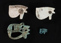 COLLECTION OF FOUR EGYPTIAN FAIENCE UDJAT EYES
Ptolemaic Period, ca. 332 - 30 BC
length max cm 3; min cm 1

Provenance: Monte Carlo, private colle...
