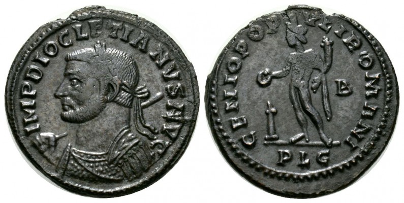 Diocletian (284-305), Follis, Lugdunum, 301-3, 9.38g, 29mm. Laureate and cuirass...