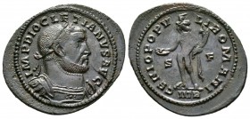 Diocletian (284-305), Follis, Treveri, c. 302-3, 6.63g, 33mm. Laureate and cuirassed bust right / Genius standing left, holding patera and cornucopia;...
