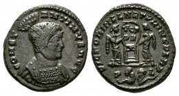 Constantine I (307/310-337), Follis, Ludgunum, 319-20, 3.76g, 18mm. Helmeted and cuirassed bust right / Two Victories holding shield inscribed VOT/PR ...