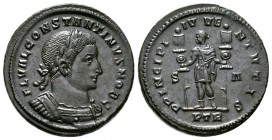 Constantine I (307/310-337), Follis, Treveri, AD 307, 10.24g, 28mm. Laureate and cuirassed bust right / Constantine standing left, holding a standard ...