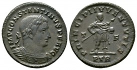 Constantine I (307/310-337), Follis, Treveri, AD 309, 6.05g, 26mm. Laureate and cuirassed bust right / Constantine standing right, holding spear and g...
