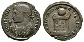 Constantine I (307/310-337), Follis, Treveri, AD 322, 2.99g, 18mm. Laureate bust left, wearing trabea, holding eagle-tipped sceptre / Globe set on alt...