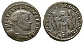 Licinius I (308-324), Follis, Siscia, AD 319, 3.64g, 18mm. Laureate and cuirassed bust right / Two Victories holding shield inscribed VOT/PR in two li...