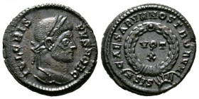 Crispus (Caesar, 316-326), Follis, Siscia, 321-4, 3.52g, 19mm. Laureate head right / CAESARVM NOSTRORVM, VOT / X in two lines; all within laurel wreat...