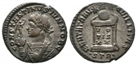 Constantine II (Caesar, 316-337), Follis, Treveri, 322-3, 3.36g, 18mm. Laureate and cuirassed bust left, holding Victory on a globe in right hand, eag...