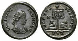 Licinius II (Caesar, 317-324), Follis, Treveri, AD 320, 2.98g, 18mm. Radiate, draped and cuirassed bust right / Two captives seated on either side of ...