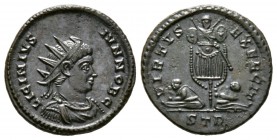 Licinius II (Caesar, 317-324), Follis, Treveri, AD 320, 2.89g, 18mm. Radiate, draped and cuirassed bust right / Two captives seated at foot of trophy;...
