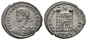 Constantius II (Caesar, 324-337), Follis, Treveri, AD 326, 3.62g, 19mm. Laureate, draped and cuirassed bust left / Camp-gate with two turrets and no d...