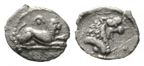 Cyprus, Amathos, c. 450-400 BC, Hemiobol, 0.24g, 7mm. Lion laying right; crescent and pellet above / Forepart of lion right. BMC 5. Very Fine and Extr...
