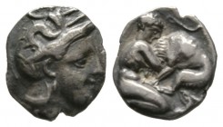 Southern Apulia, Tarentum, c. 380-325 BC, Diobol, 0.95g, 9mm. Head of Athena right, wearing crested helmet decorated with Skylla / Herakles kneeling r...