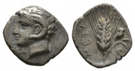 Southern Lucania, Metapontion, c. 325-275 BC, Diobol , 1.01g, 11mm. Head of Apollo Karneios left / Barley ear with leaf to right; owl and grasshopper ...