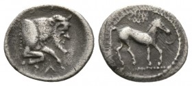 Sicily, Gela, c. 465-450 BC, Litra, 0.81g, 12mm. Horse advancing right; wreath above / Forepart of man-headed bull right. Jenkins, Gela, Group III; HG...