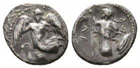 Sicily, Kamarina, c. 461-440/35 BC, Litra, 0.77g, 11mm. Nike flying left; below, swan standing left; all within wreath / Athena standing left, holding...