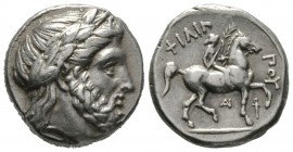 Kings of Macedon, Philip II (359-336 BC), Tetradrachm, Amphipolis, c. 320/19-317 BC, 14.26g, 23mm. Laureate head of Zeus right / Youth on horseback ri...