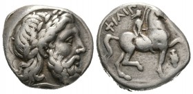 Kings of Macedon, Philip II (359-336 BC), Tetradrachm, Amphipolis, 14.32g, 25mm. Laureate head of Zeus right / Youth, holding branch, on horseback rig...