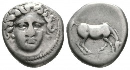 Thessaly, Larissa, c. 400-370 BC, Drachm, 5.87g, 17mm. Head of the nymph Larissa facing slightly right / Horse grazing right, with legs slightly bent....