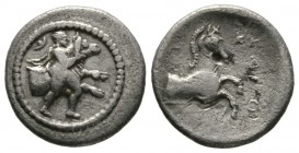 Thessaly, Trikka, c. 440-400 BC, Hemidrachm, 2.74g, 15mm. Thessalos, petasos and cloak tied at neck, holding band around head of forepart of bull righ...